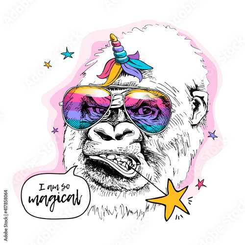 Gorilla in a rainbow glasses, unicorn mane and horn. I am so magical - lettering quote. Humor card, t-shirt composition, hand drawn style print. Vector illustration.