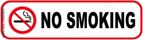 A sign that says : NO SMOKING 
