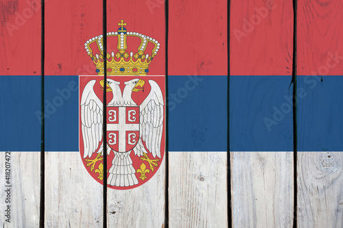 national flag of Serbia on wooden texture