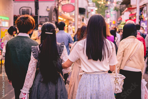 Couple of cute japanese girls in Takeshita Street, Harajuku, Tokyo, Japan