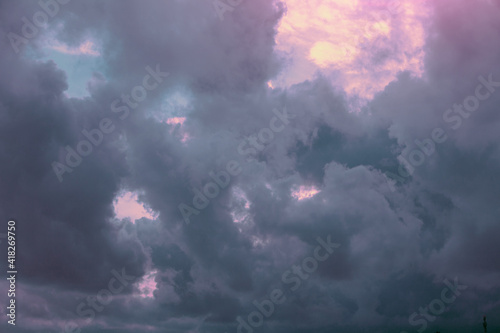The dramatic stormy cloudy sky during sunset. Sky texture. Abstract nature background