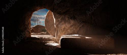 Crucifixion and Resurrection. Empty tomb of Jesus with crosses in the background. Easter or Resurrection concept. He is Risen.