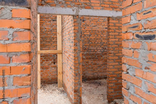 Door monolithic concrete lintel unfinished building construction.