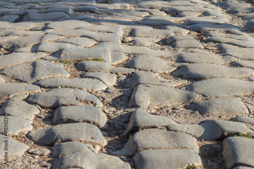 Stamp Wheel tracks on ancient roman cobble street,The first important main road was the famous "Appian Way" known as the The "Queen of all roads" was cut in 312 BC.