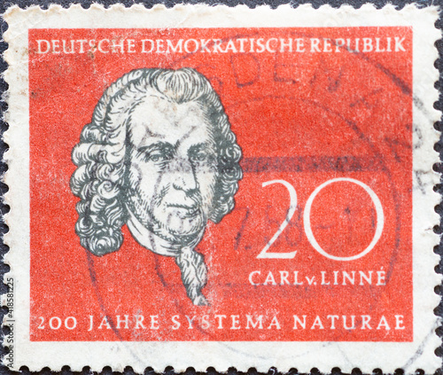 GERMANY, DDR - CIRCA 1958 : a postage stamp from Germany, GDR showing a portrait of the naturalist Carl von Linné (1707–1778). Famous scientist