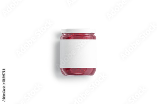 Blank glass jar with white label and berry jam mockup