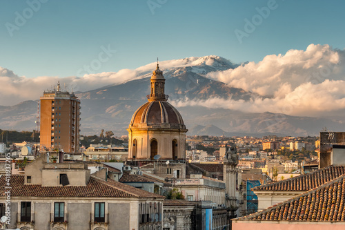 Catania cityscape with the view of Etna volcano in Sicily, Italy.
