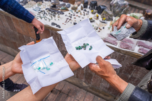 sale of emeralds at emerald market, rosario square, Bogota, Colombia 