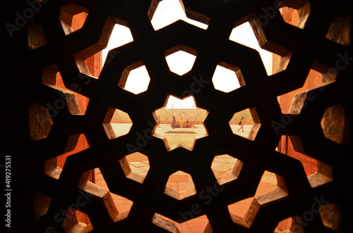 Intricate ornamental stone window, Humayun's Tomb, Delhi, India.