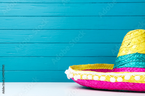 Mexican hat on blue wooden background