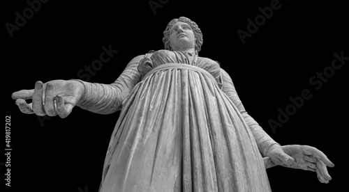 Ancient white marble sculpture of Melpomene muse of tragedy. Statue of sensual classic art isolated on black background