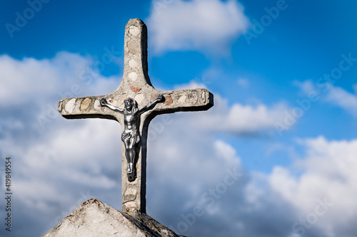 cross against the blue sky