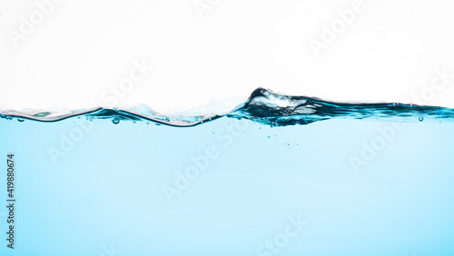 Water wave with bubbles, isolated on the white background.