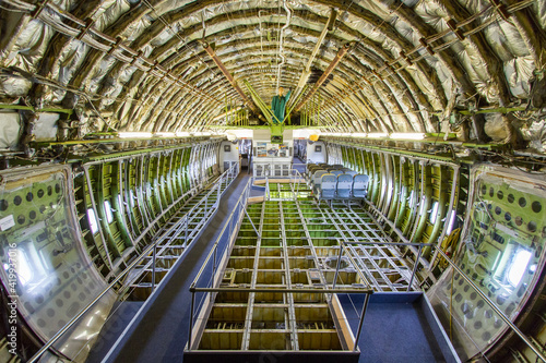 Inside view of a dismantled widebody airplane fuselage 