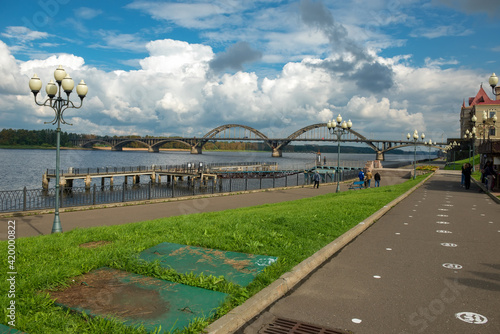 Panorama of the Volga embankment and a road bridge across the Volga river in the city of Rybinsk