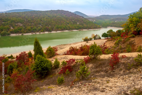 Autumn mountain landscape. Cypress Lake Ssuko. Krasnodar Territory.