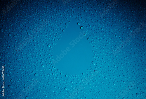 Water Drops as Droplet Shape on Blue Background. World Water Day Concept. Environment Care. CSR, Corporate Social Responsibility or CSC, Corporate Social Contribution