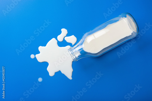 bad milk lactose intolerance allergy. milk bottle splatter. avoid dangerous dairy