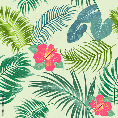 Tropical vector seamless pattern with leaves of palm tree and flowers