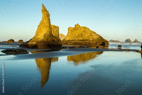 USA, Oregon, Bandon Beach. Wizard's Hat formation at sunset.