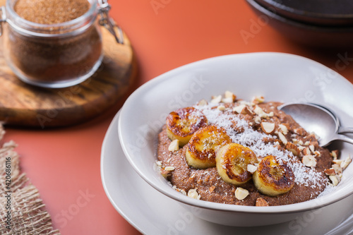 Teff grain porridge with banana topping for breakfast