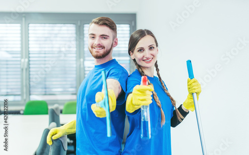 Woman and man in commercial cleaner team