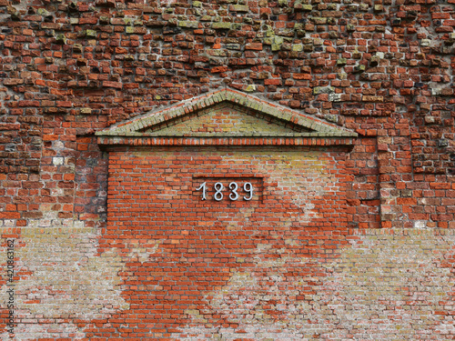 Closeup shot of the number 1839 on a brick exterior wall