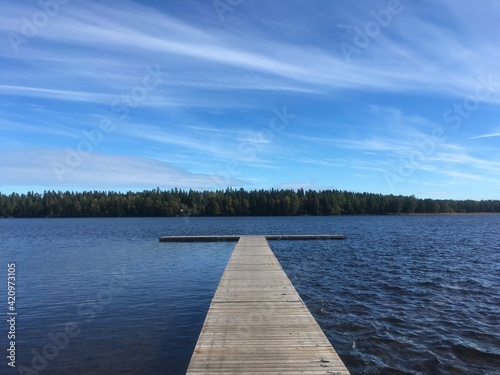 Wooden pier on the lake in Northern Sweden