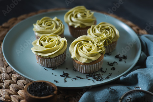 Cupcakes topped with green tea buttercream