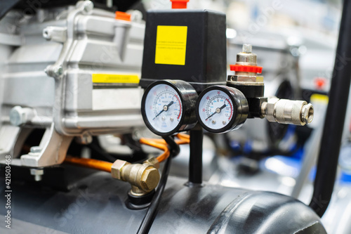 Fragment of a gasoline compressor with pressure sensors. Close-up