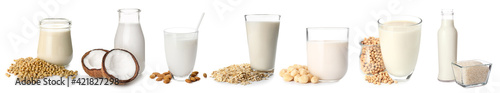 Different vegan milks on white background