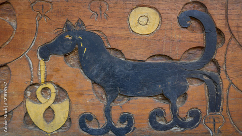 Closeup view of traditional Ngada people or tribe wood carving of black horse symbol in Tololela village near Bajawa, Flores, East Nusa Tenggara, Indonesia