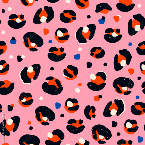 Pink Leopard fur. Wild animal texture. Hand drawn spots. Abstract contemporary seamless Pattern. Background, wallpaper. Modern illustration in Vector. Perfect for textile prints or wrapping paper