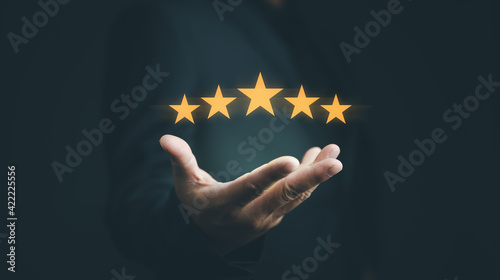 Customer evaluation feedback.men in suit Giving Positive Review for Client's Satisfaction Surveys.giving a five star rating. Service rating, satisfaction concept