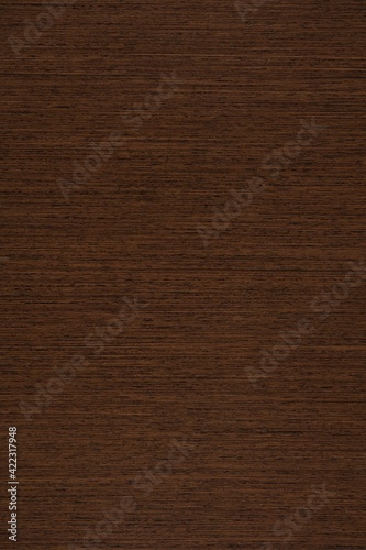 Balanced Wenge veneer background in dark color, texture as part of your awesome interior.