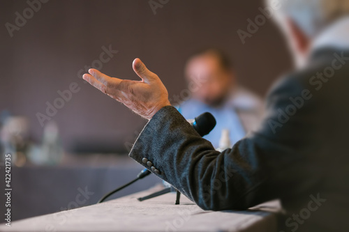 people debating at business presentation