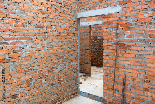 Door monolithic concrete lintel unfinished building construction.