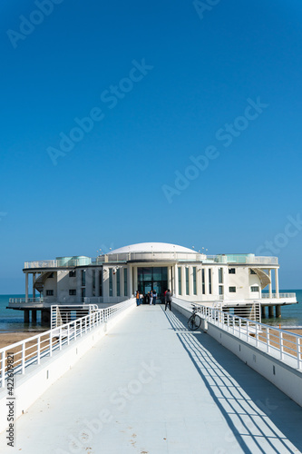 Vertical shot of Rotonda a Mare in Senigallia, Italy on a blue sky background