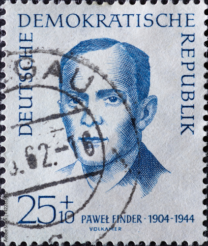 GERMANY, DDR - CIRCA 1962 : a postage stamp from Germany, GDR showing a portrait of the murdered anti-fascist and resistance fighter against Hilter: Paweł Finder (1904–1944), Polish party functionary