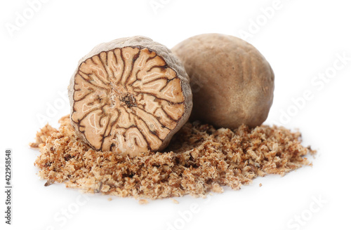 Grated nutmeg and seeds isolated on white