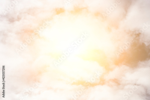 sky with clouds and bright sun. bright consecration