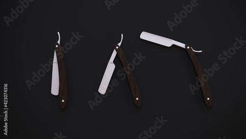 3d rendering. three straight razors with a wooden handle on a black background.