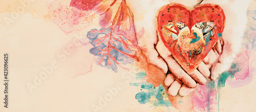 Heart in hand. Conceptual watercolor banner.