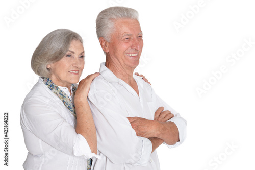 happy senior couple on white background