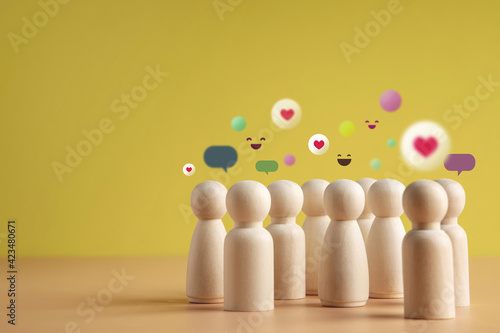 Psychology Personality Concept. Extrovert Person. person who Happy and Enjoy by Talking, Interaction, Party Often. presenting by wooden peg dolls