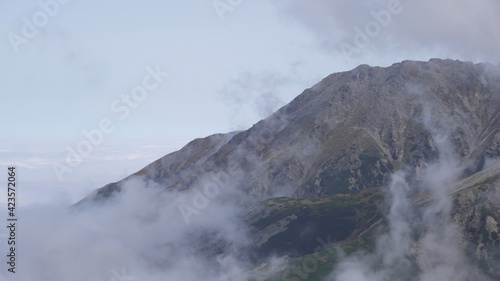 Koscielec from Kasprowy Wierch. Mountain covered in the clouds. High quality photo