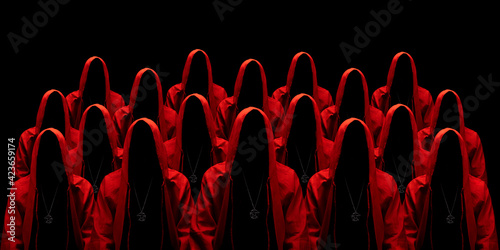People dressed in a red robes looking like a cult members on a dark background. No face. Occult, sect concept. 