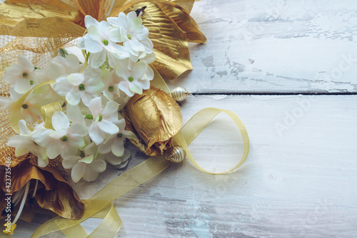 golden lilies ribbon and beads with hydrangea flowers