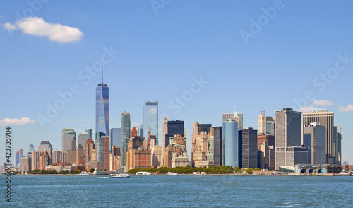 Manhattan waterfront skyline on a sunny summer day, New York City, USA.