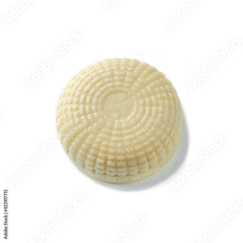 Suluguni is an original cheese. No packaging. View from above. White background. Isolated.
